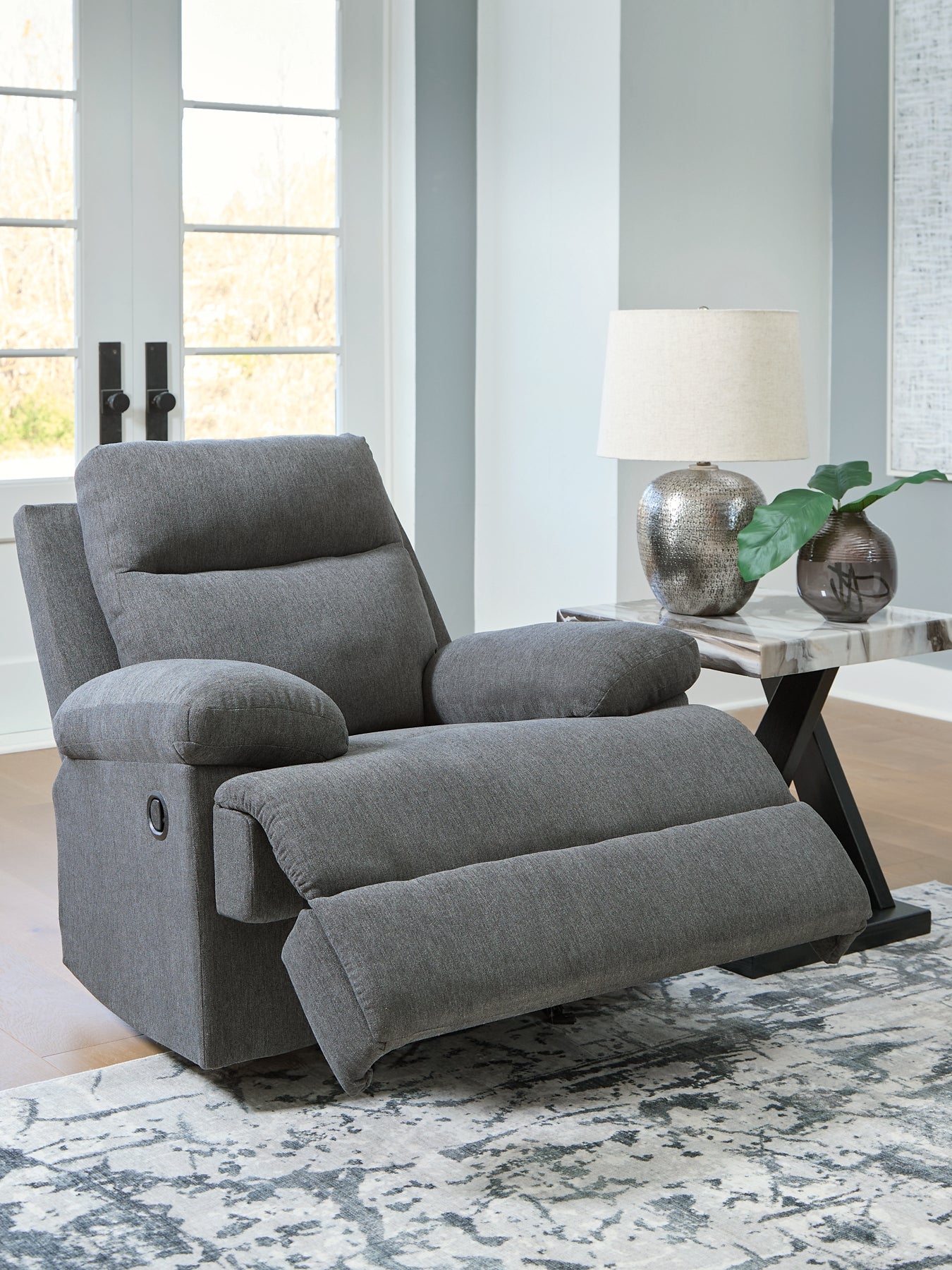 Fauteuil inclinable à bascule à glissement latéral