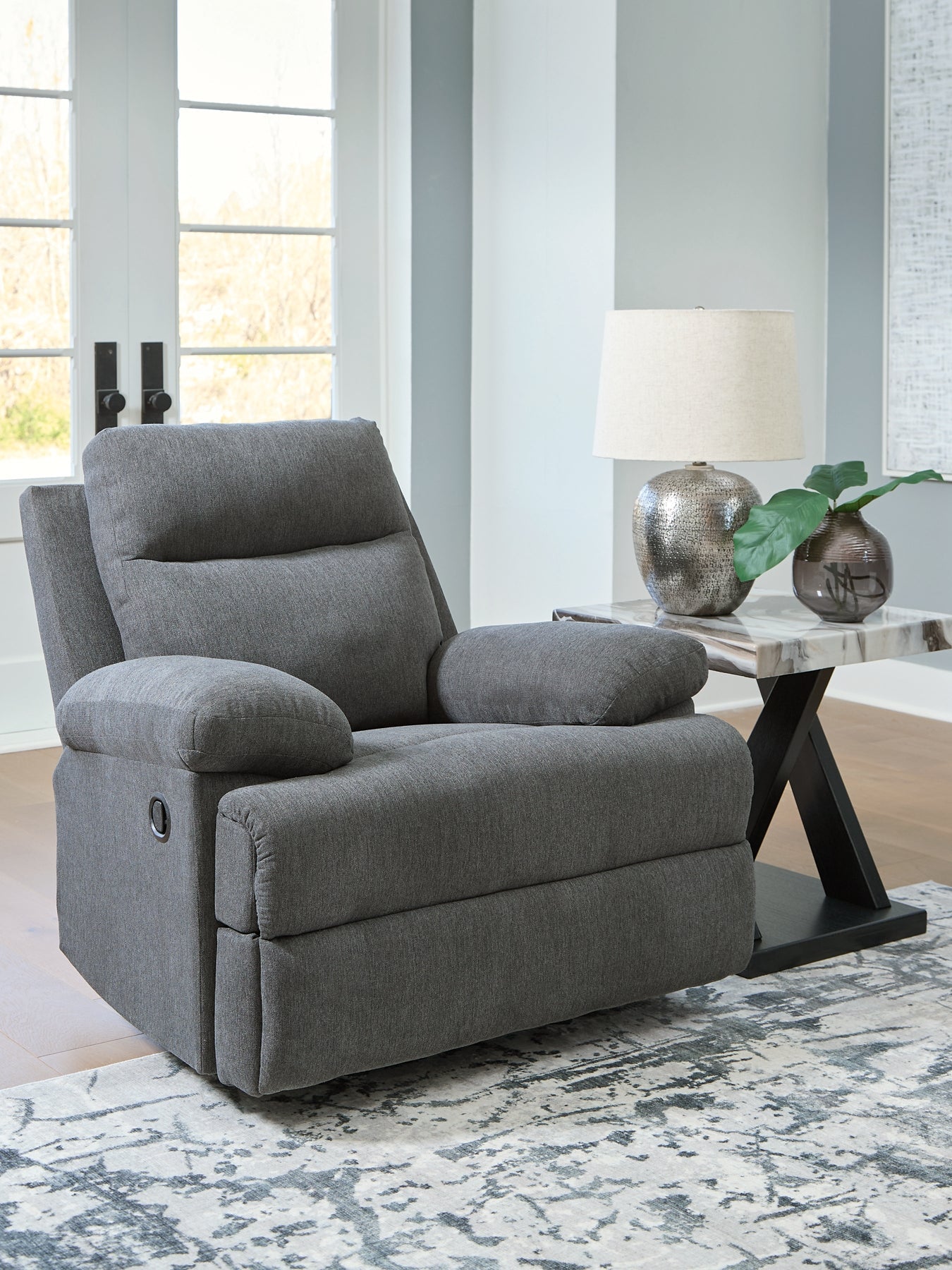 Fauteuil inclinable à bascule à glissement latéral